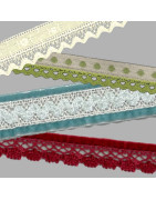 Encajes cosidos compuestos de tiras bordadas o cintas con encajes de bolillos